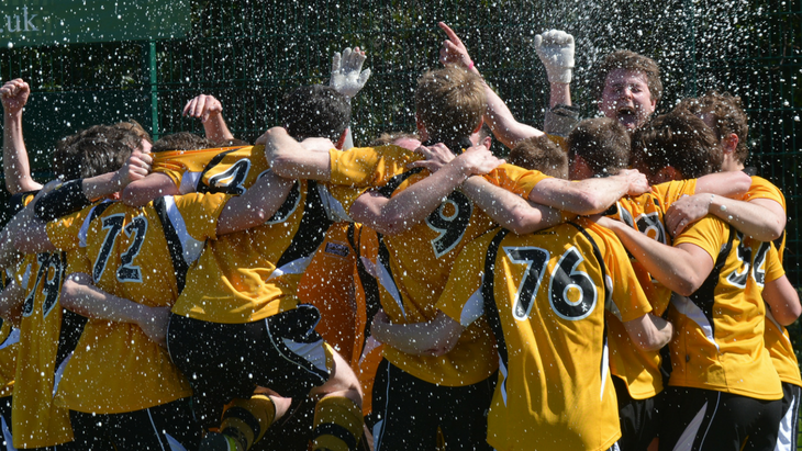 Members of a sports team celebrating